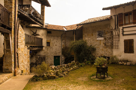 Poffabro, Italy - March 20th 2022. Historic residential buildings in Poffabro, a medieval village in the Val Colvera valley in Pordenone province, Friuli-Venezia Giulia, north east Italyのeditorial素材