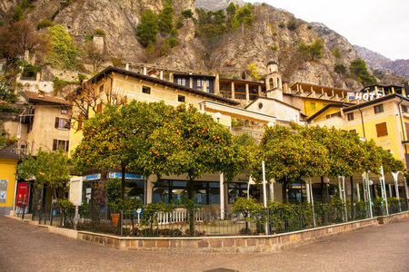 Limone sul Garda, Italy - December 24th 2021. A quiet waterfront street in winter in the small town of Limone sul Garda on the north east shore of Lake Garda, Brescia province, Lombardy, Italyのeditorial素材