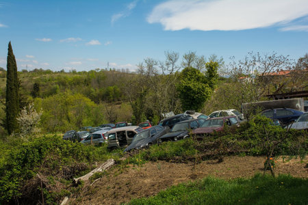 Kascerga, Croatia - April 17th 2022. A cemetery of damaged cars in the countryside of rural Istria, western Croatiaのeditorial素材