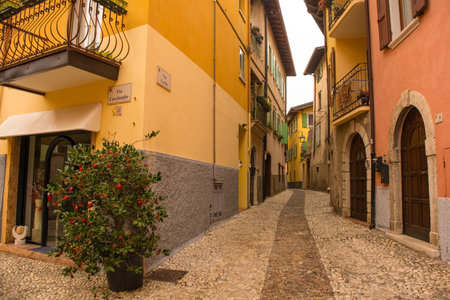 Malcesine, Italy - December 25th 2022. A quiet street in winter in the small town of Malcesine on the north shore of lake Garda, Verona Province, Veneto, north east, Italyのeditorial素材
