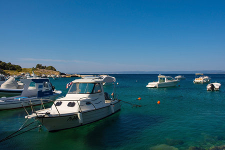 Stara Baska, Croatia - 6th September 2021. Boats moored at the coastal town of Stara Baska on Krk island in the Primorje-Gorski Kotar County of western Croatiaのeditorial素材