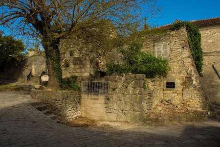 Old derelict residential buildings in the historic medieval hill village of Buzet in Istria, western Croatiaの写真素材