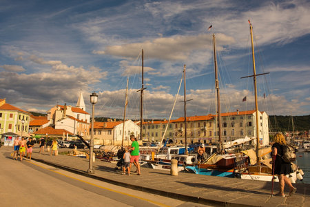 Izola, Slovenia - 9th July 2022. The waterfront of the historic medieval town of Izola on the Adriatic coast of Sloveniaのeditorial素材