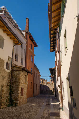 A quiet back street in the historic medieval centre of Cividale del Friuli, Udine Province, Friuli-Venezia Giulia, north east Italyの写真素材