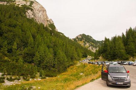 Soca, Slovenia - August 22nd 2022. The cars of tourists and day trippers line the Vrsic Pass in north west Slovenia. It is the highest mountain pass in Sloveniaのeditorial素材