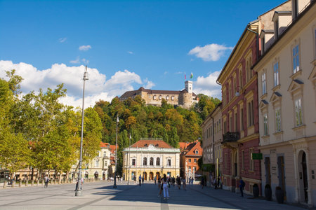 Ljubljana, Slovenia - September 4th 2022. Congress Square - Kongresni Trg - in central Ljubljana, Slovenia. Ljubljana Castle can be seen on Castle Hill in the background, and Park Zvezda to the leftのeditorial素材