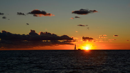 A beautiful sunset on the waterfront of Piran town in Slovenia in mid Septemberの写真素材