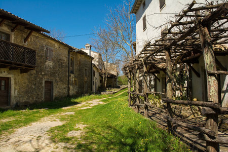 Old residential buildings in the historic little medieval village of Kotli near Buzet in Istria, western Croatiaの写真素材