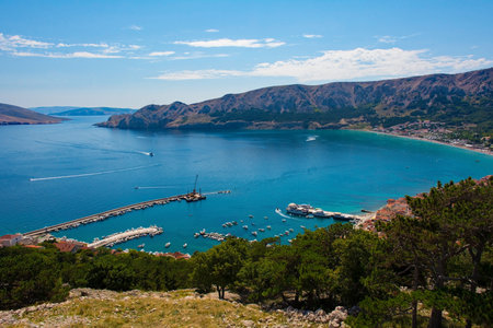 A view of Baska Bay in the south of Krk Island, western Croatia. Taken from Baska Citadel on a hill overlooking the bay in late summerの写真素材
