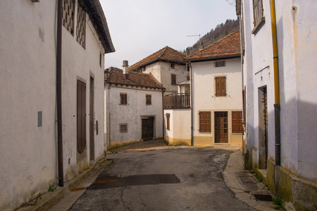 A street in the village of Trava in Lauco district, Udine Province, Friuli-Venezia Giulia, north east Italyの素材 [FY310207396435]