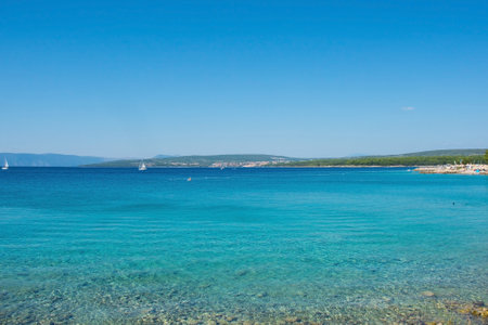 The late summer coastline near to Punat on Krk Island in Primorje-Gorski Kotar County in western Croatiaの写真素材