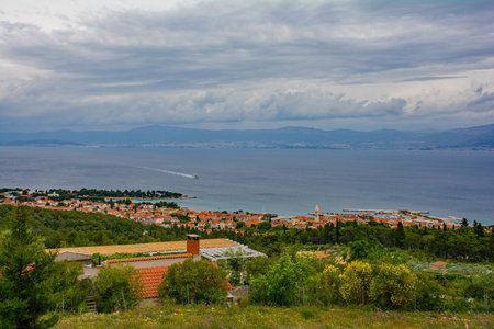 Supetar seen from the hills above the town on Brac Island, Dalmatia, Croatia. Looking towards the mainland close to Splitの写真素材