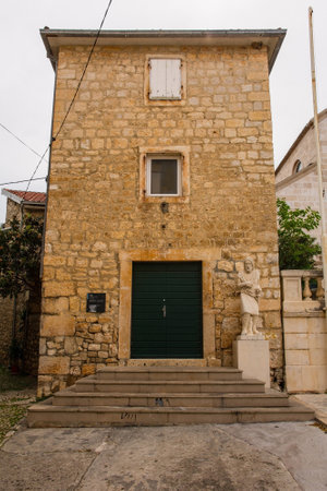 Supetar, Croatia - May 13th 2023. The historic stone building housing the Parish Church Museum in Supetar on Brac Islandのeditorial素材