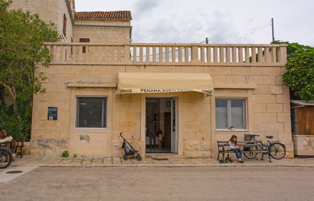 Supetar, Croatia - May 13th 2023. Dujmovic House or Dujmovic Kuca in Supetar on Brac Island, Croatia. Dating from 1734, it is the oldest preserved residential building in Supetarのeditorial素材