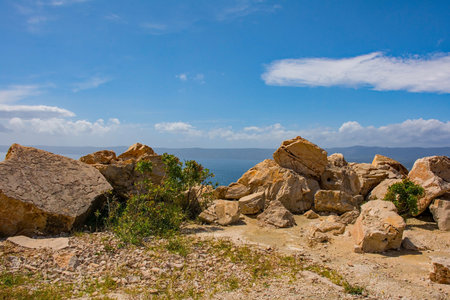 The coast near Bol on the south coast of Brac Island in Croatia in Mayの写真素材
