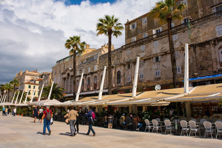 Split, Croatia - May 12th 2023. The historic Riva waterfront in the centre of Split, Croatia. Lined with bars and restaurants, it is popular with tourists and locals alikeのeditorial素材