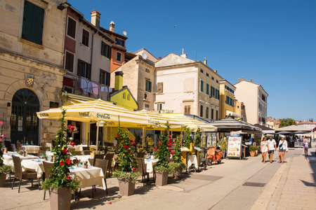 Rovinj, Croatia - July 9th 2023. Restaurants in the historic centre of Rovinj old town in Istria, Croatiaのeditorial素材