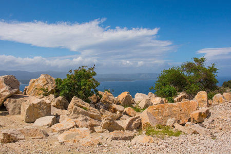 The coast near Bol on the south coast of Brac Island in Croatia in Mayの写真素材