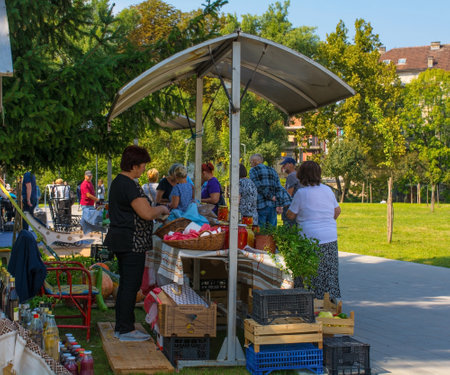Bihac, Bosnia - September 7th 2023. A market stall sells fresh fruit and vegetables, herbs and pickles in central Bihac, Una-Sana Canton, Federation of Bosnia and Herzegovinaのeditorial素材