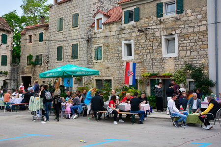 Kastela, Croatia â May 20th 2023. The annual bob festival celebrating the broad bean or fava bean, known as bob in Croatian, in Kastel Kambelovac in Kastela on the coast of the Croatian mainlandのeditorial素材