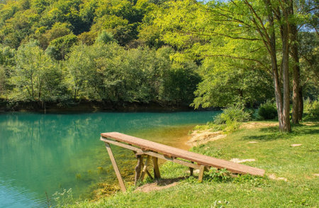 A wooden diving board on the River Una near Orasac, Bihac, in the Una National Park. Una-Sana Canton, Federation of Bosnia and Herzegovina. Early Septemberの写真素材