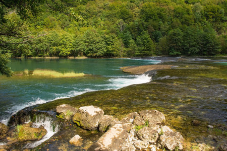 Troslap Lohovo, a small waterfall in the River Una near Lohovo, Bihac in Una-Sana Canton, Federation of Bosnia and Herzegovina. Located within the Una National Park. Early Septemberの写真素材