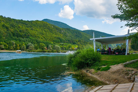 Lohovo, Bosnia - September 7th 2023. A restaurant on the banks of the River Una near Lohovo, Bihac, in the Una National Park. Una-Sana Canton, Federation of Bosnia and Herzegovina. Early Septemberのeditorial素材