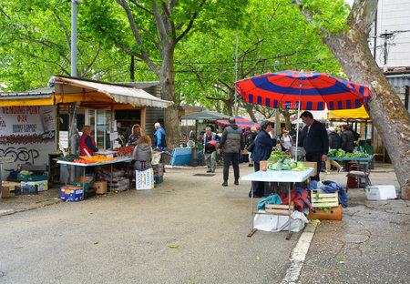 Split, Croatia - May 12th 2023. Traders sell fruit and vegetables from their stalls at the outdoor market in the centre of Split, Croatiaのeditorial素材