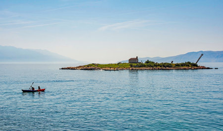 The island of San Marino off the Adriatic coast of Novi Vinodolski, Primorje-Gorski Kotar County, Croatia. Mid-September. The historic Sv Martina chapel is the only building on this small islandのeditorial素材