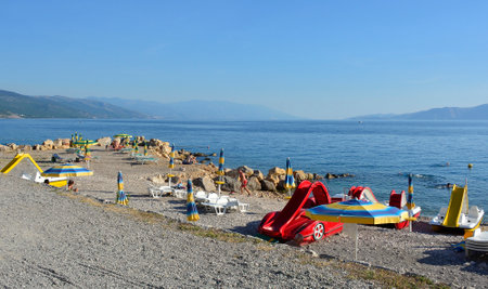 Novi Vinodolski, Croatia â September 11th 2023. Late summer at the city beach of Novi Vinodolski, Primorje-Gorski Kotar County, Croatiaのeditorial素材