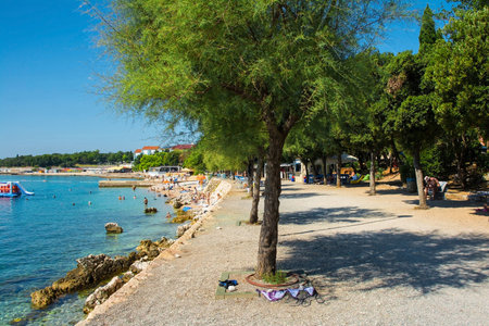 Novi Vinodolski, Croatia â September 11th 2023. Late summer at the city beach of Novi Vinodolski, Primorje-Gorski Kotar County, Croatiaのeditorial素材
