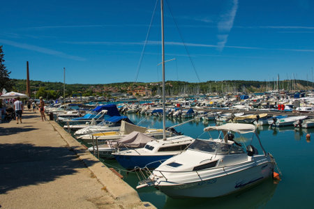 Izola, Slovenia - 9th July 2022. The marina of the historic medieval town of Izola on the Adriatic coast of Sloveniaのeditorial素材