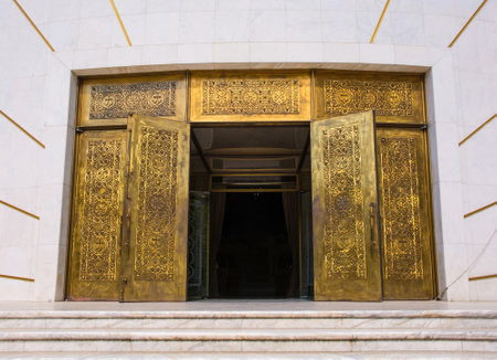 The main entrance of the Eastern Orthodox New Resurrection Cathedral in central Tirana, Albania. Opening in 2012 and known as Katedralja Ngjallja e Krishtit in Albanian, it is a contemporary interpretation of traditional Byzantine architecture styleの写真素材