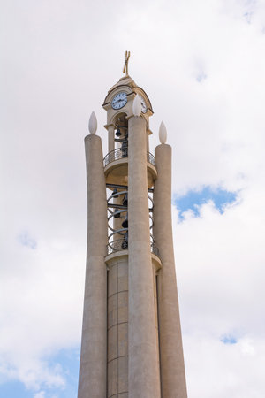 The bell tower of the Eastern Orthodox New Resurrection Cathedral in central Tirana, Albania. Opening in 2012 and known as Katedralja Ngjallja e Krishtit in Albanian, it is a contemporary interpretation of traditional Byzantine architecture style. The bell tower is representative of 4 Paschal candlesの写真素材