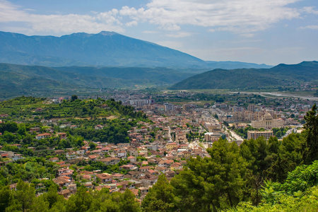 A view of Berat in Albania taken from Berat Castle. In the foreground is the Mangalem quarter, part of the historic UNESCO listed area. Lagja 30 Vjetori district is in the background, this is the more modern, post-war part of townの写真素材