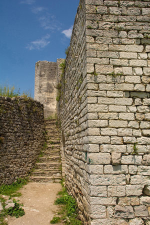The ruins of the late 15th century White Mosque within the Citadel of the fortified Berat Castle, southern Albania, a UNESCO World Heritage Site. The castle is a blend of Byzantine, Ottoman and medieval Albanian architectural influences, it is located on Kalaja Hill overlooking Berat and the Osum River. Xhamia e Bardhe in Albanianの写真素材