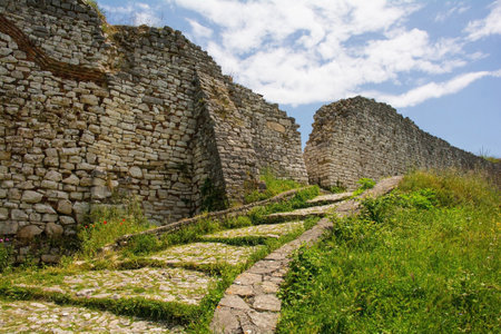 Part of the fortified walls of the 13th century Citadel within Berat Castle, southern Albania. A blend of Byzantine, Ottoman and medieval Albanian architectural influences. Located on Kalaja Hill overlooking Berat and the Osum Riverの写真素材