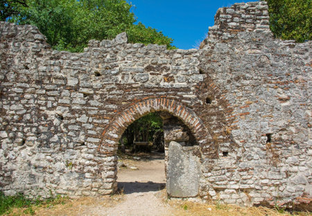 The Hellenistic Water Gate in Butrint Archaeological Park, within Butrint National Park, southern Albania. A UNESCO World Heritage Site. Also known as the Channel-Side City Wall, it was a major gateway. Originally built in the 6th century then rebuilt 13th-14th centuries when it was reduced to a smaller openingの写真素材