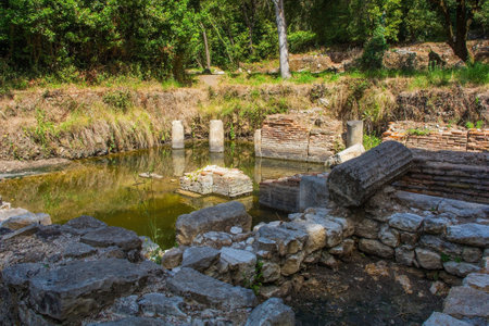 The 2nd century Gymnasium Complex in Butrint Archaeological Park, within Butrint National Park, southern Albania. A UNESCO World Heritage Site. Also called the Palaestra, it was likely a place for athletic training and social gatherings. It has a rectangular courtyard surrounded by porticos, typical of urban Roman gymnasiumsの写真素材