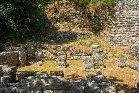 Ruins in Butrint Archaeological Park, within Butrint National Park, southern Albania. Located near to the Great Basilica. A UNESCO World Heritage Site.の写真素材