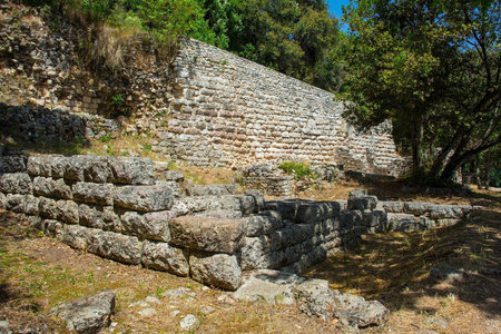 Ruins in Butrint Archaeological Park, within Butrint National Park, southern Albania. Located near to the Great Basilica. A UNESCO World Heritage Site.の写真素材