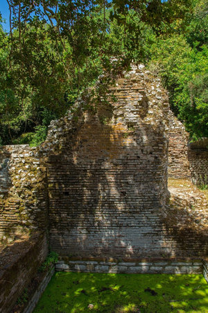 Ruins in Butrint Archaeological Park, within Butrint National Park, southern Albania. Located near to the Great Basilica. A UNESCO World Heritage Site.の写真素材