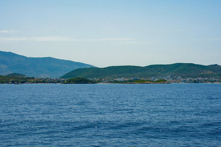 The Ionian coastline near Ksamil, part of the Albanian Riviera. Here, the green hills of the Ceraunian mountain range meet the Straits of Corfu in the eastern Mediterranean Seaの写真素材