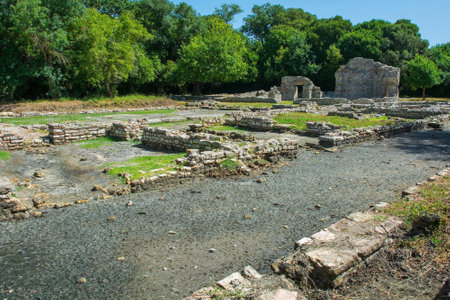 The remains of the 5th century Triconch Palace in Butrint Archaeological Park, within Butrint National Park, southern Albania. A UNESCO World Heritage Site. A late-Roman luxurious domestic complex built round peristyle courtyard. It was expanded during the Byzantine period, so has many Byzantine architectural featuresの写真素材