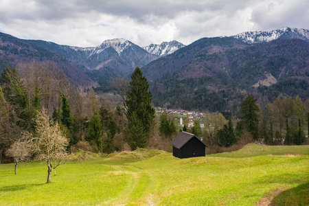 The early spring alpine landscape around the village of Luint in Carnia, Udine Province, Friuli-Venezia Giulia, north east Italyの写真素材