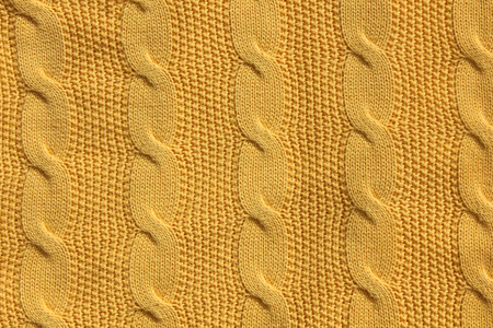 A close up detailed shot of cable knitted patternの写真素材