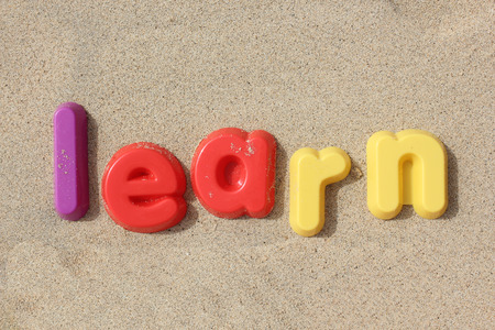 A playful image spelling out the word 'learn' with toy plastic letters. Learning is fun.の写真素材
