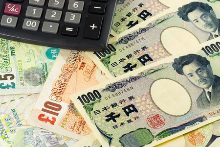 British and Japanese currency pair commonly used in forex trading with calculatorの写真素材