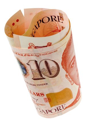 Rolled Singapore dollar notes isolated on white background