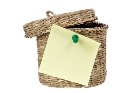 Basket with sticky note isolated on white backgroundの写真素材